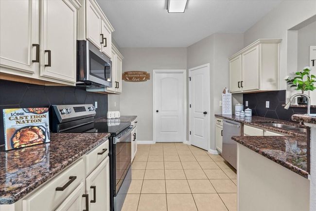 This kitchen stirs the soul and inspires the chef within, with ample space for cooking and gathering. | Image 13