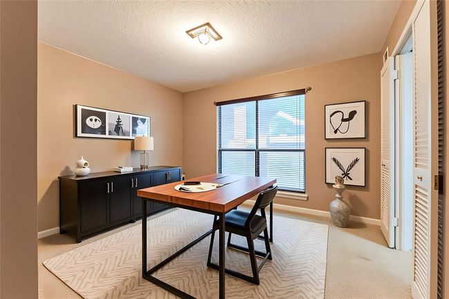 Study area located downstairs for convenience - virtually staged | Image 13