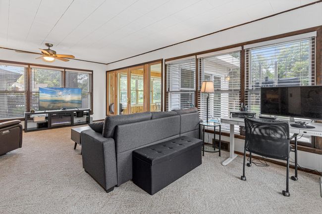 Large family room flooded with natural light | Image 14