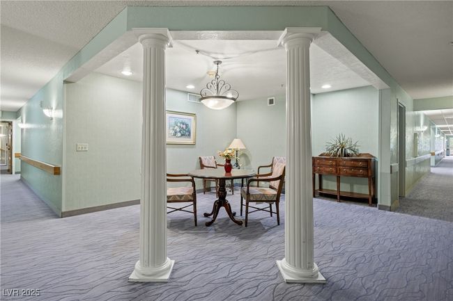 Common Dining space featuring visible vents, decorative columns, carpet flooring, and baseboards | Image 34