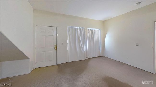 Entryway featuring tile entry and carpet floors | Image 6