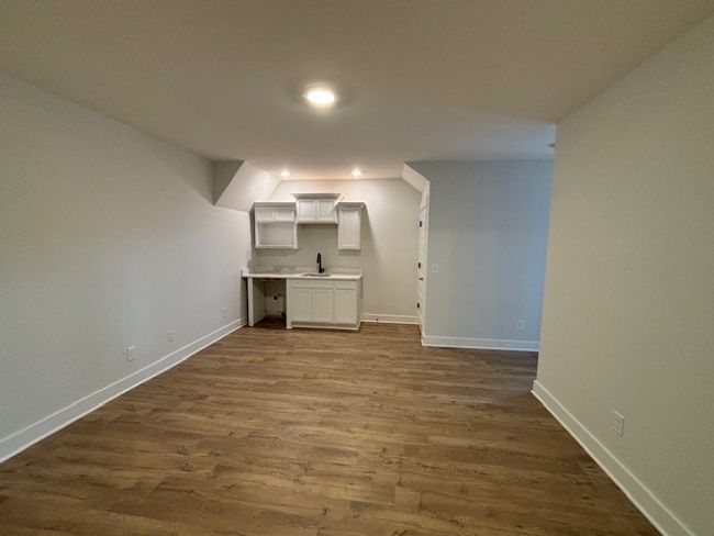 Lower level living area with separate entrances from outside | Image 14