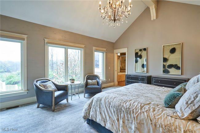 First floor Master Bedroom with vaulted beam ceiling and wall of windows! | Image 15