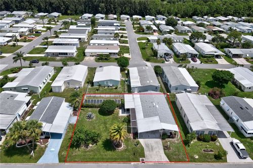 338 Macadamia Dr, Barefoot Bay, FL, 32976-6824 | Card Image
