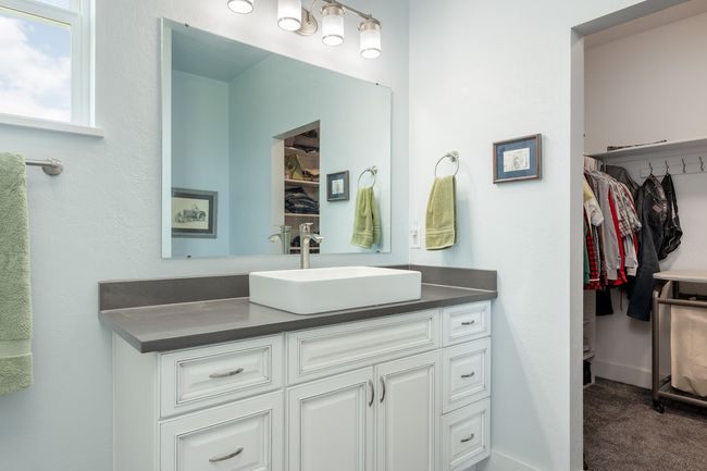 Vessel sink, quartz counters, large walk-in closet | Image 7