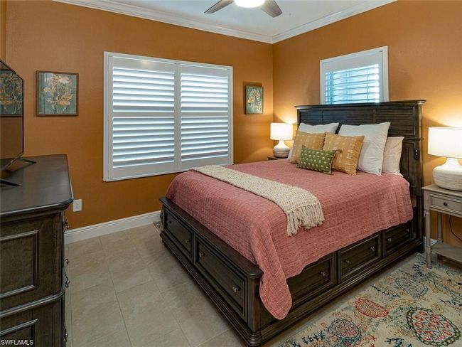 Bedroom with ornamental molding and ceiling fan | Image 14