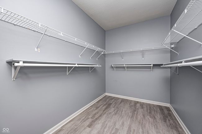 Primary Bedroom walk-in closet. | Image 26
