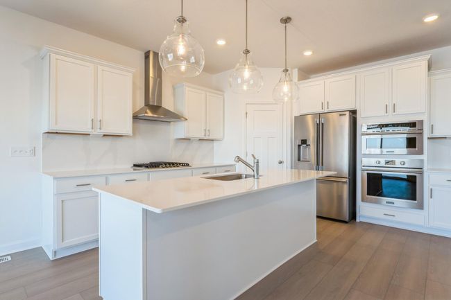 (*Photo of similar home, actual homes colors and finishes will vary) This home will offer a stunning gourmet kitchen! | Image 18