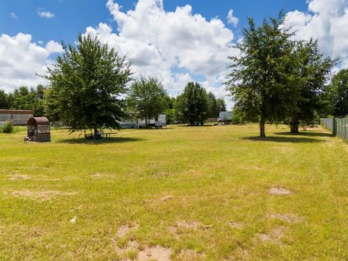 1586 County Road 3542, Cleveland, TX, 77327-1871 | Card Image