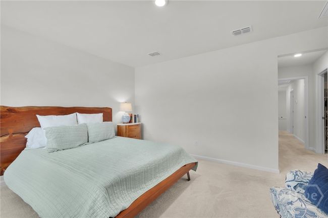 Spacious master bedroom. | Image 42