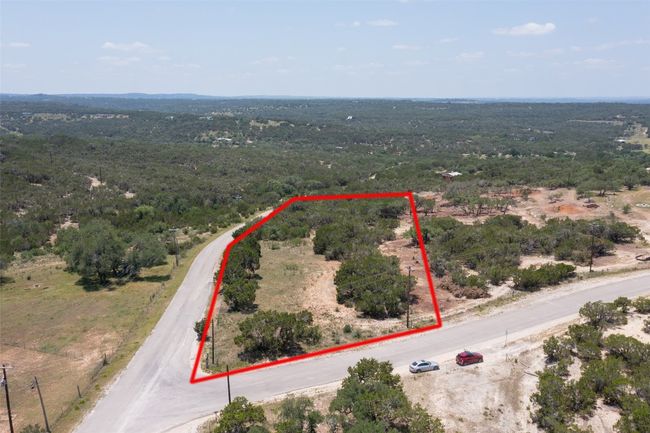 View of property location with property boundaries highlighted and a forest | Image 23