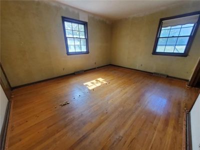 Spare room with light hardwood / wood-style flooring and a wealth of natural light | Image 2