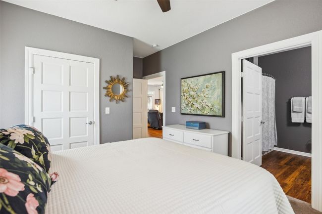 Primary Bedroom with carpet, baseboards, and a ceiling fan | Image 24