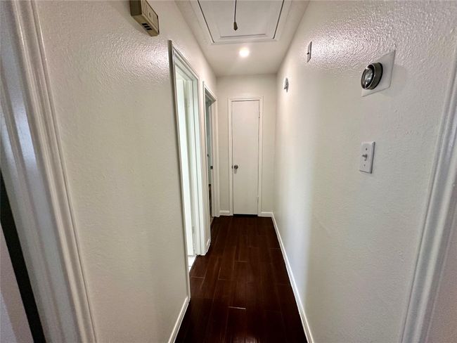 Hallway leading to 2nd & 3rd bedroom suite | Image 27