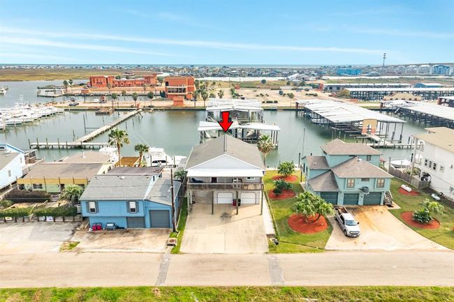 Aerial view of 56 Marlin with concrete pad and pitched roof for vaulted ceilings. | Image 37