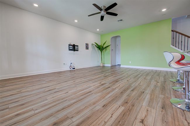 Family Room with Extended Countertop & Arched Walkway - First Floor | Image 8