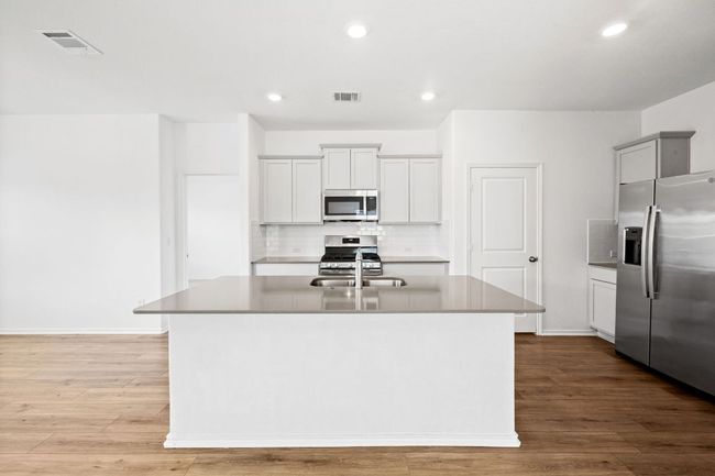 215 Silver Springs Bnd, House other with 3 bedrooms, 2 bathrooms and 2 parking in Kyle TX | Image 6
