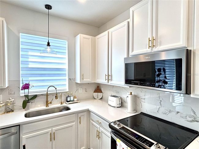 921 Spring Palms Loop, Townhouse with 3 bedrooms, 3 bathrooms and null parking in ORLANDO FL | Image 18