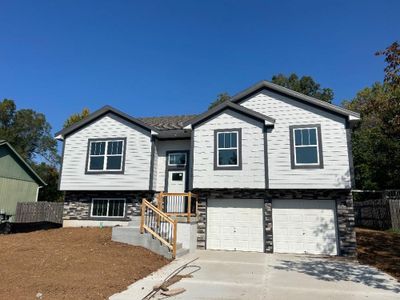 Split foyer home with a garage | Image 1