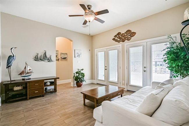 Downstairs living space | Image 18