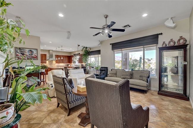 Living room featuring a ceiling fan and recessed lighting | Image 29