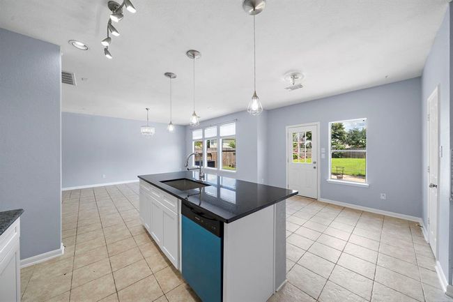 Homeowner did not remove the protective coverings from new appliances. They are stainless steel appliances. | Image 13