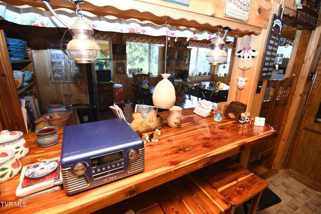 cedar bar between kitchen and dining room | Image 89