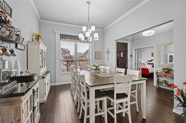 Spacious formal dining room at the front of the home. | Image 9