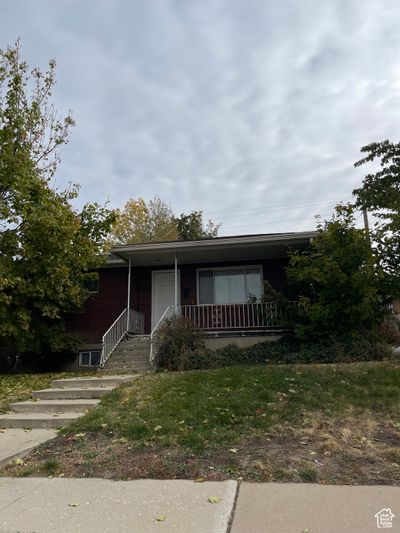 View of front of house featuring a porch | Image 1