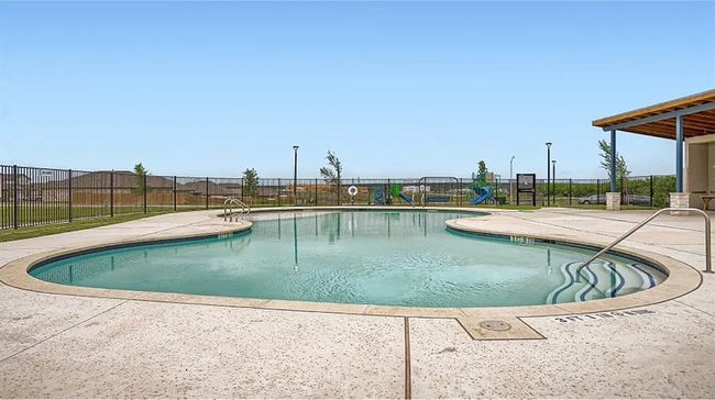 Community pool featuring a patio | Image 38