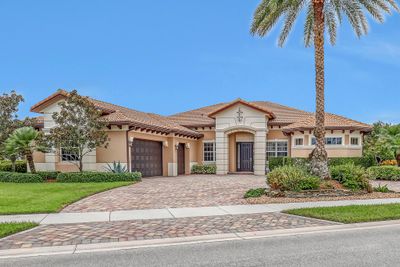 104 Manor Circle, House other with 4 bedrooms, 3 bathrooms and null parking in Jupiter FL | Image 1