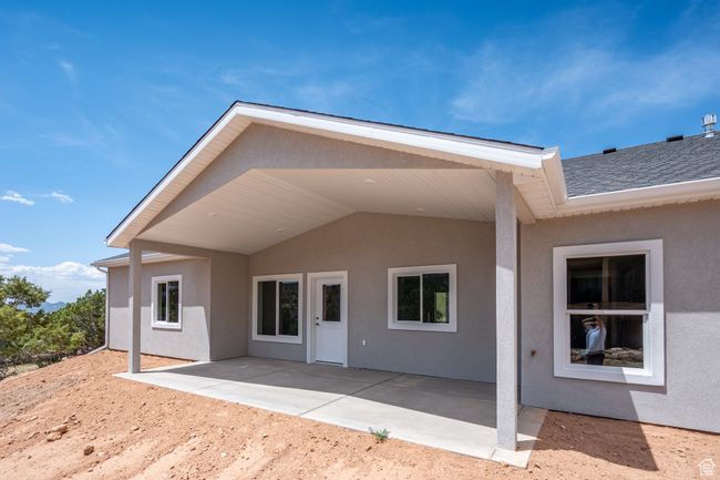 Back of house featuring a patio area and stucco siding | Image 51