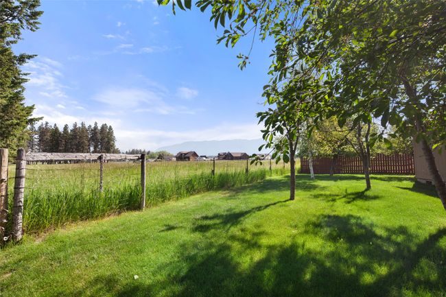 View of yard with a mountain view | Image 30