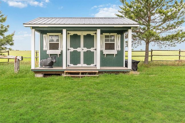 View of shed featuring fence | Image 26