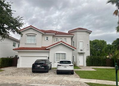 7064 Nw 113th Pl, House other with 6 bedrooms, 3 bathrooms and null parking in Doral FL | Image 1