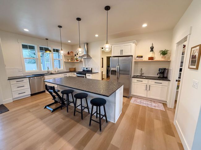 Kitchen featuring center island | Image 26