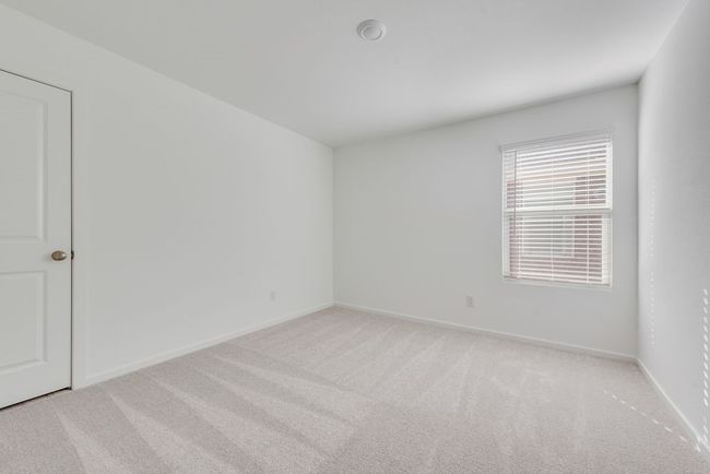 Unfurnished room featuring light colored carpet and baseboards | Image 19
