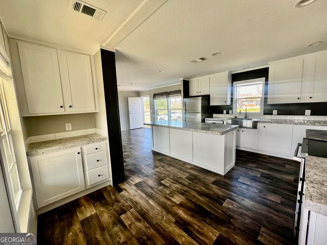 1404 1 St Ave, House other with 4 bedrooms, 2 bathrooms and null parking in Rochelle GA | Image 14