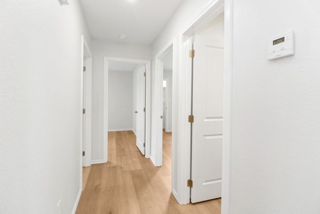Hallway to Guest Bedrooms | Image 14