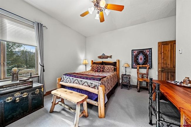 Main level bedroom with ensuite bathroom | Image 24