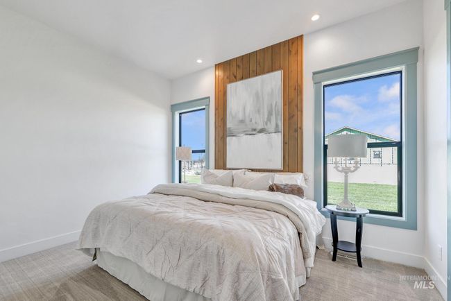 Bedroom with light carpet, multiple windows, and recessed lighting | Image 27