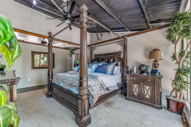 Bedroom with baseboards and carpet flooring | Image 13