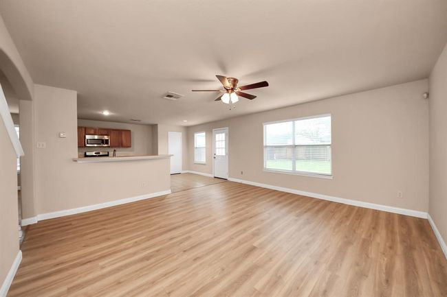 Living area is open with so much natural light | Image 6