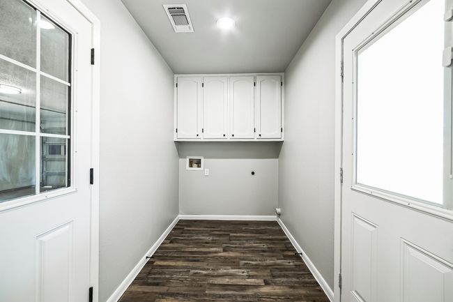 Washroom with visible vents, hookup for an electric dryer, baseboards, and washer hookup | Image 29