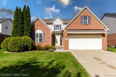 879 Autumn Ridge Drive, Home with 3 bedrooms, 2 bathrooms and null parking in Westland MI | Image 1