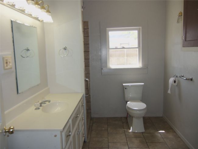 hall bath with ceramic tile shower | Image 16