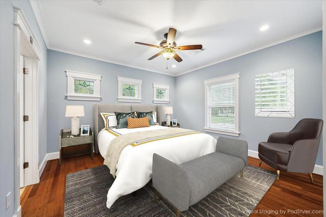 LUXURIOUS PRIMARY SUITE OFFERS CROWN MOLDING , BEAUTIFUL STAINED GLASS WINDOWS AND WELCOMES LARGE FURNITURE | Image 24