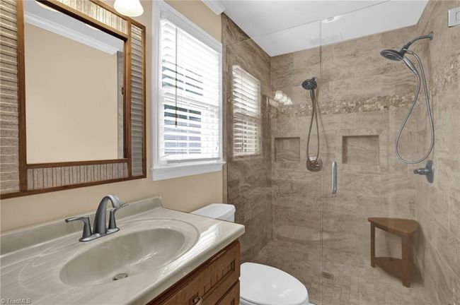 En-suite bath with large walk-in shower and dual heads | Image 15