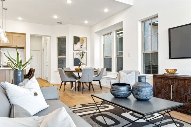 Living area featuring light wood-type flooring and recessed lighting | Image 14