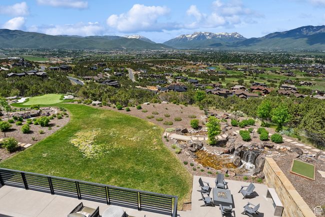 Aerial perspective of suburban area featuring a mountainous background | Image 124